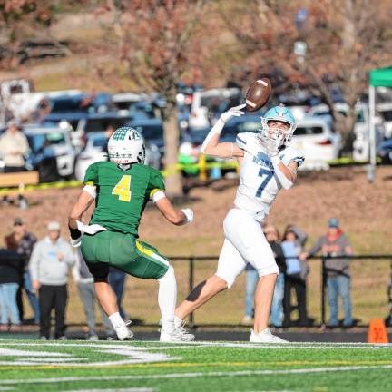 <b>Sparta’s Stone Herbison attempts to make an acrobatic first-half pass reception but is unable to secure possession for what would have been a first down deep in the Montville end of the field. (Photo by Glenn Clark)</b>