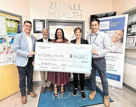 From left, state Assemblyman Michael Inganamort, R-24; Zufall Health family medicine physician Michael Ganon; Bristol Myers Squibb Foundation senior director Adrienne Gonzalez; Zufall Health president and chief executive Fran Palm; and Zufall Health senior vice president of medical services Douglas Bishop. (Photo provided)