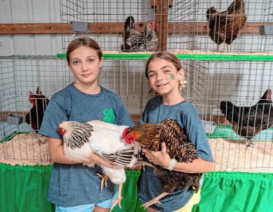 <b>Halley Greenwale with Alice and Kaley Holloway with Bella. (Photo by Nancy Madacsi)</b>