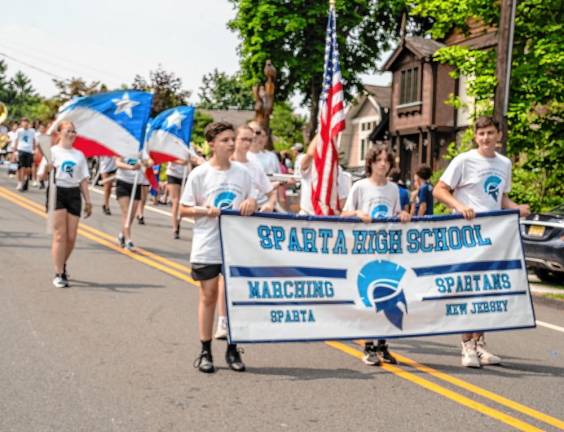 The Sparta High School Marching Band takes part in the parade.