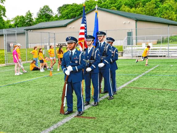 The U.S. Air Force Color Guard opens the event with the National Anthem. Other military branches, including the Marine Corps and Army, sent representatives.