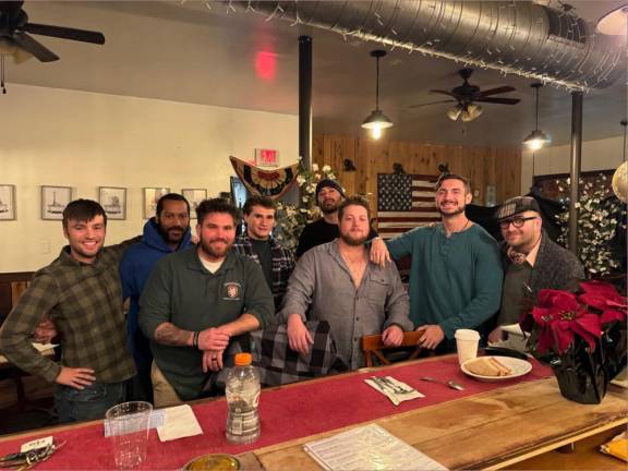 Matt Michaud, left, producer of ‘Emerald Ties,’ and associate producer Nicholas Buckley, second from left, rehearse the cast for a week before filming begins. (Photo by Kevan Ali)