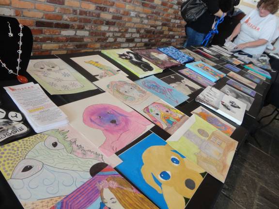 Local students donated art to sell to raise money for O.S.C.A.R.