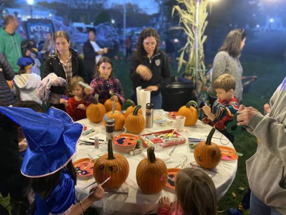 HH4 Children work on Halloween-themed crafts.