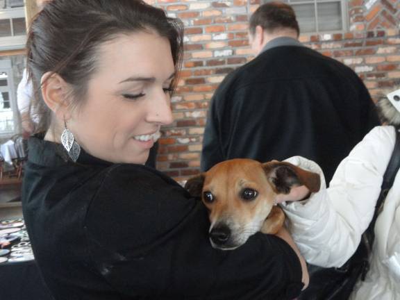 Mohawk House employee Shannon Snure, of West Milford, takes a break with Bailey.