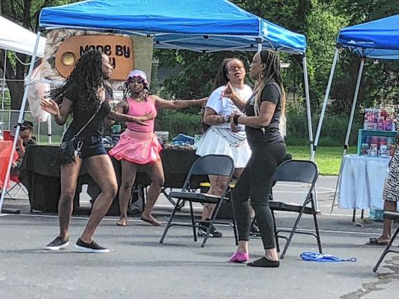Resident dance during the Juneteenth Celebration.