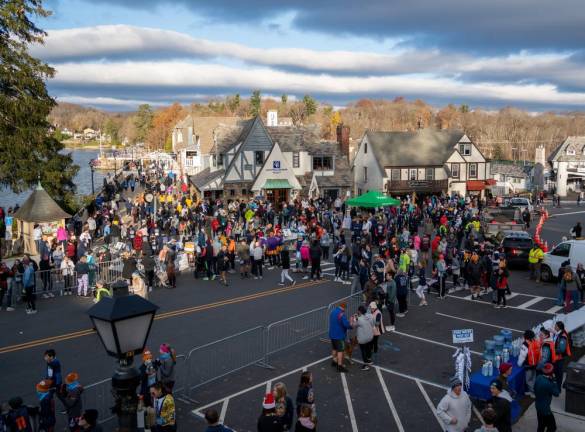 The crowd gathers for the race. More than 3,000 people participated in the 5K Run/Walk and a one-mile Fun Run/Walk sponsored by the Sparta Education Foundation.