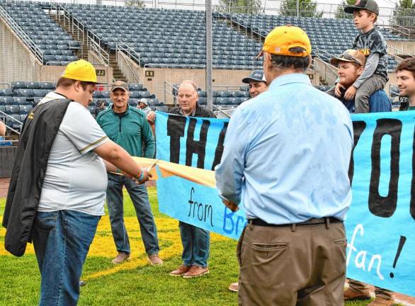 Brandon Bordt cuts a ribbon at a ceremony to celebrate the conclusion of the Brandon’s House project May 14 at Skylands Stadium in Augusta. (Photos by Maria Kovic)