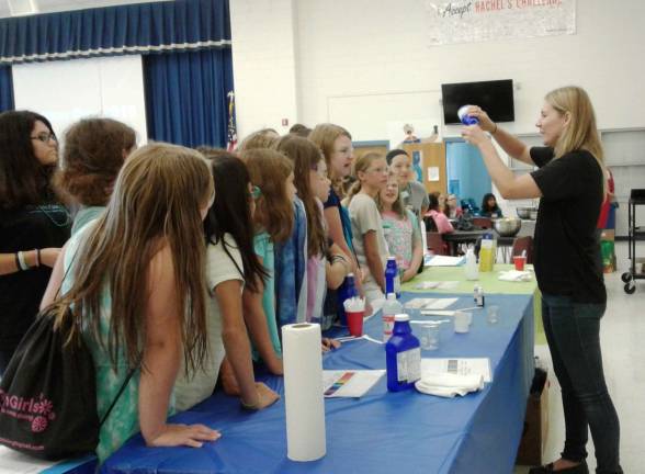 Learning about chemicals at the Bayer Pharmaceuticals exhibit Photos by Meghan Byers