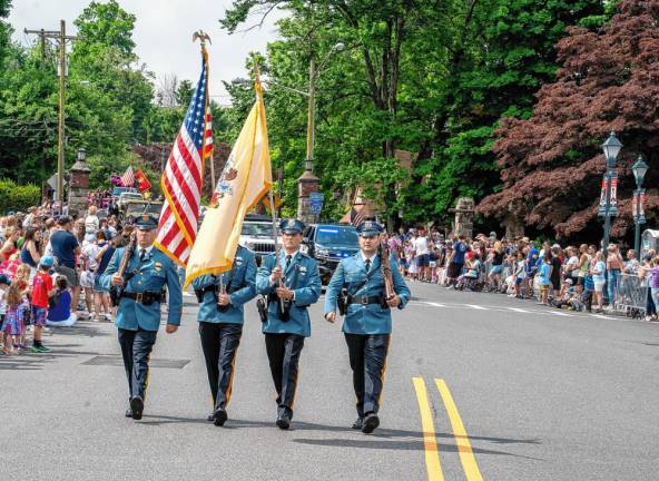 Police officers march near the beginning of the parade.