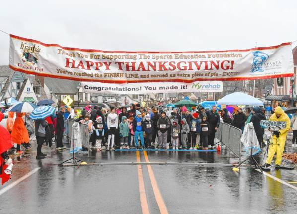 Runners line up for the start of the 18th annual Krogh’s Turkey Trot on Thursday, Nov. 28 in Sparta. (Photos by Maria Kovic)