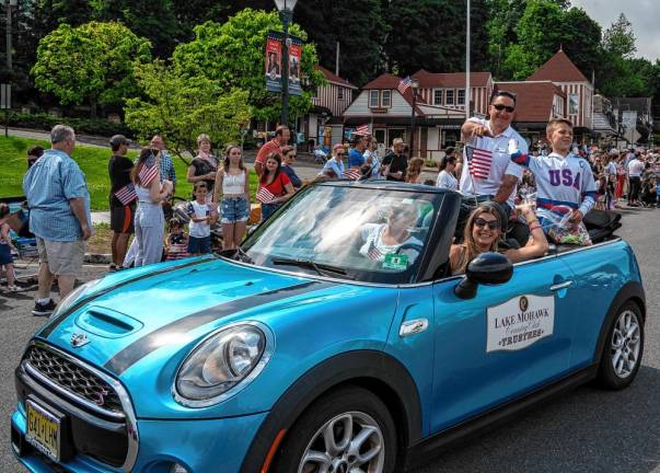 Lake Mohawk trustees ride in the parade.