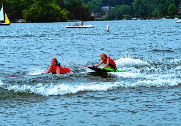 Mackenzie Reid and Marina Lieb on their kneeboards.