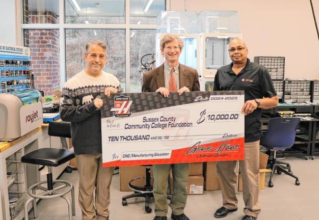 From left are Stan Kula, executive director of the SCCC Foundation; Jon Connolly, SCCC president; and Mark Harris, applications engineer/education specialist at Allendale Machinery Systems. (Photo provided)