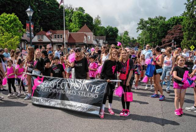 Students of Perfect Pointe Performing Arts Studio march in the parade.