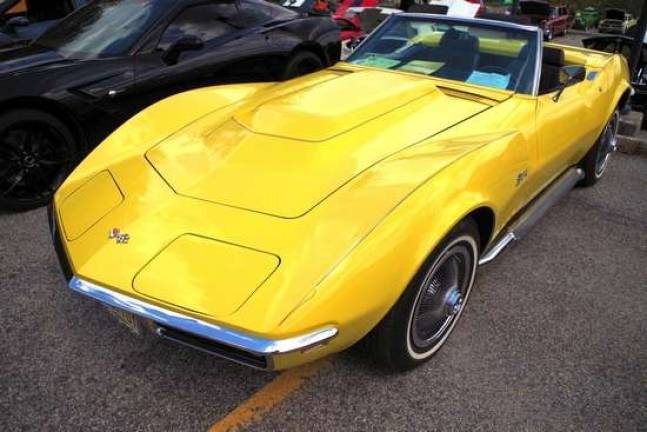 A yellow 1969 Chevy Corvette owned by Ralph Smith of Branchville on displayat the 14th Annual Pocono Mountains Corvette Club 9/11 Memorial Car Show on Sunday, Aug. 16, 2015 at Sussex County Community College in Newton.