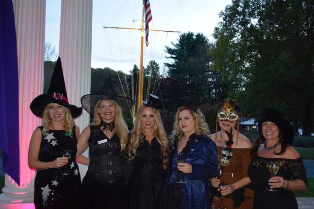 The 'good witches' from left: Beth Tiger, Theresa Byrne, Eden Marie James Biele, Susan Marek, Mary Parent, Tokar Glenn