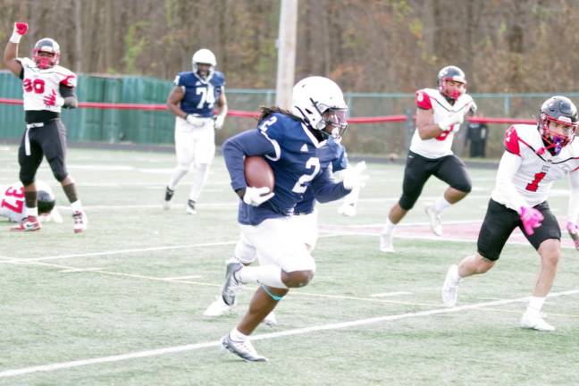 Sussex running back Jaiden Murphy carries the ball.