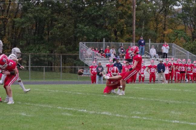 Lenape Valley kicker Tanner Gaboda (11) kicks for a point after touchdown. He scored a touchdown on offense.