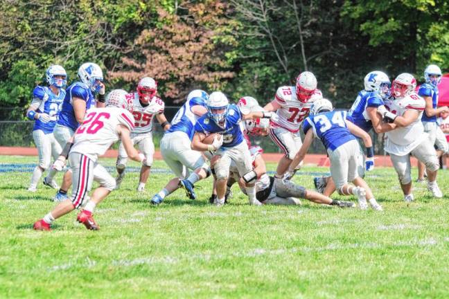 <b>Kittatinny ball carrier Kevin O'Keefe tries to break through the High Point defense in the third quarter. </b>