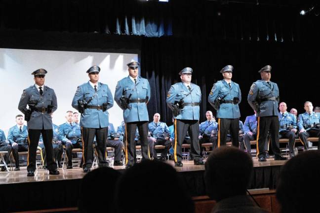 From left, Thomas Snyder was promoted to captain; Joe Antonello and Frank Schomp to lieutenant; and Scott Elig, Steve Guido and Tim Lynott to sergeant. (Photos by Dave Smith)