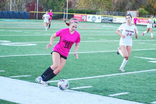 Sparta's Abigail Connors steers the ball. She scored one goal and made one assist.