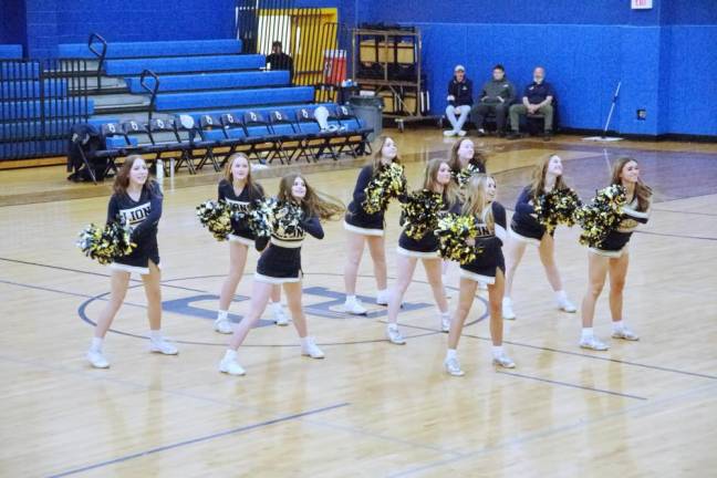 The Pope John cheerleaders perform during the halftime break.