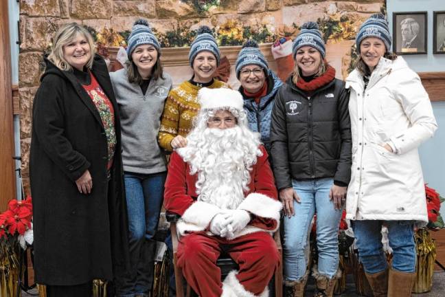 Employees of the Sparta Parks &amp; Recreation Department pose with Santa.