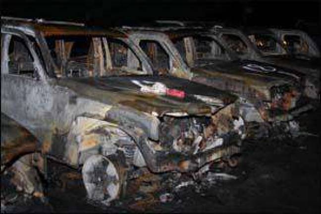 Dozens of vehicles lost in early morning fire