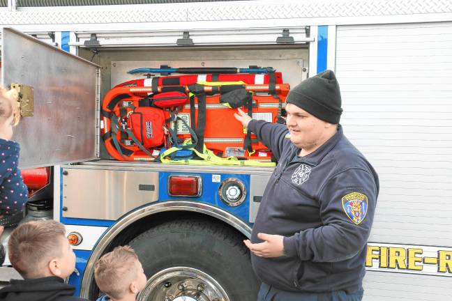 WB2 A Hampton Township first-responder shows off equipment after the restaurant opening.