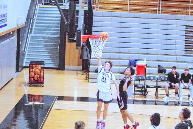 SPB3 Sparta’s Anthony Settembre shoots for the basket. He scored four points.