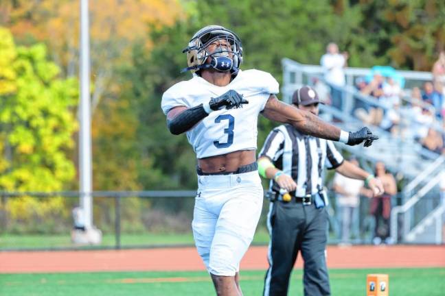 <b>Tylik Hill begins his celebration dance after scoring a touchdown against Delbarton. (Photo by Glenn Clark)</b>