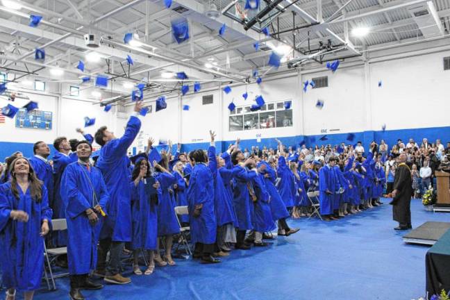 Members of the Pope John XXIII Regional High School Class of 2024 toss their caps in the air at graduation June 3. (Photos provided)