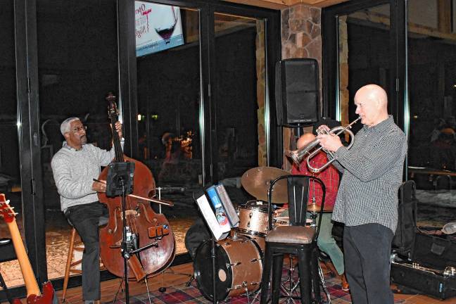 The jazz quartet Meant to Be entertains at the event.