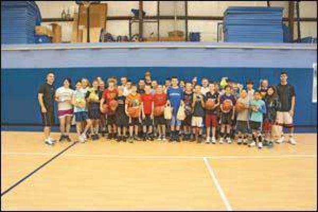 PAL basketball clinic doubles as food drive