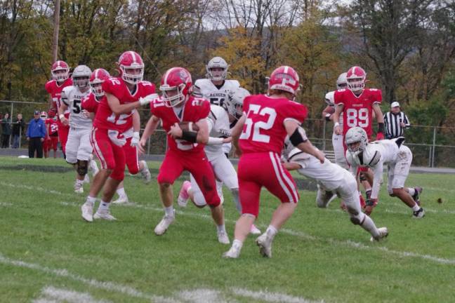 Lenape Valley ball carrier Kevin Giusti breaks through the frontline of the Wallkill Valley defense.