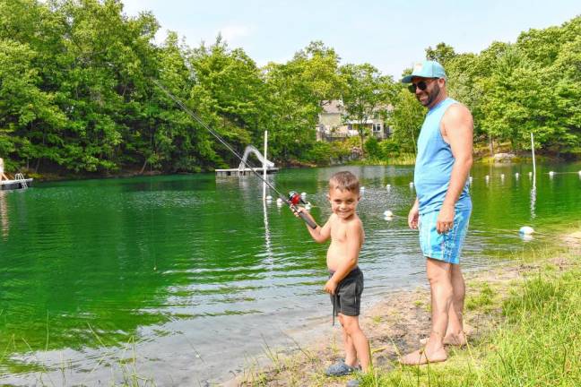 Levi and Vincent Cignarella take part in the fishing derby.