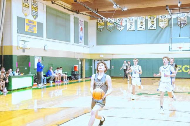 Sussex Tech's Gavin Gardner is on course for a shot attempt in the second half. He scored two points and made one steal.