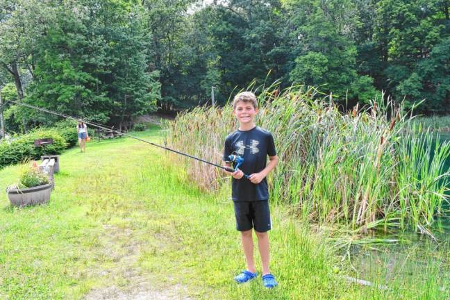 John Brennan with his fishing pole.