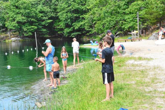 Children take part in the annual fishing derby Saturday, July 20 at Alpine Beach on Lake Mohawk. (Photos by Maria Kovic)