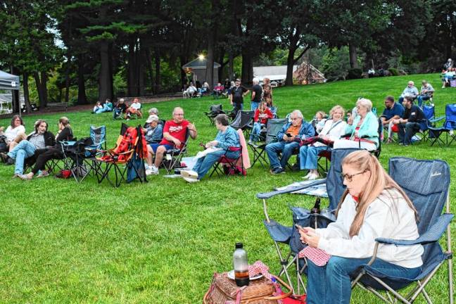 Residents gather for the concert in Dykstra Park.