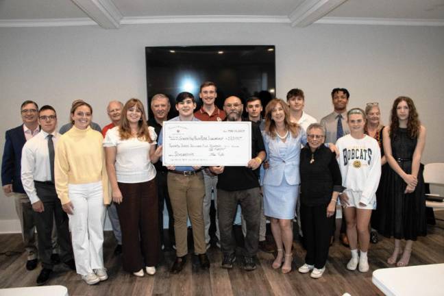 Ralph Rojas scholarship recipients pose with members of the Scholarship Committee at VFW Post #7248 in Sparta.