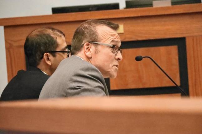 Anand Dash, left, with his attorney, Steve Warner, at the meeting. (Photos by Dave Smith)