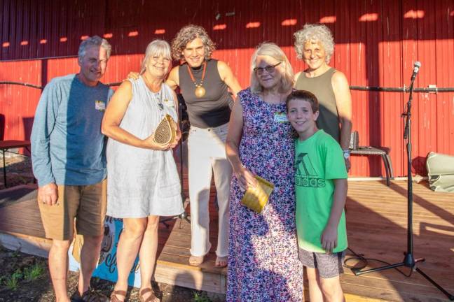 <b>April Perciballi and her gardening-sidekick grandson tied for second place with Bob and Kathy Linguanti for best garden. From left are Bob and Kathy Linguanti, Dirt Editor and Publisher Becca Tucker, April Perciballi and her grandson Aidan, and Straus News Publisher Jeanne Straus.</b>