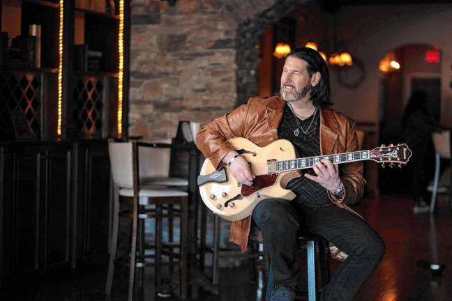 <b>George Orlando performs Thursday, Jan. 2 at Krogh’s Restaurant &amp; Brew Pub in Sparta. (Photo by Carlos Alvarado)</b>