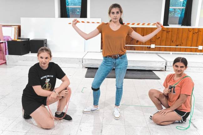 <b>From left, Katie Colgan, Olivia Tomlin and Marley Lane rehearse ‘Whipped Into Shape.’</b>