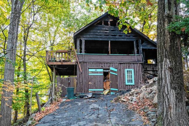 A house fire at 190 West Shore Trail, Sparta, was reported Monday, Oct. 14. (Photos by Nancy Madacsi)