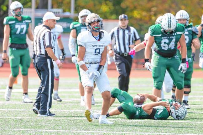 <b>Sam Conetta of Pope John celebrates his sack of Delbarton quarterback Jadon Prinzivalli in the first half. (Photo by Glenn Clark)</b>