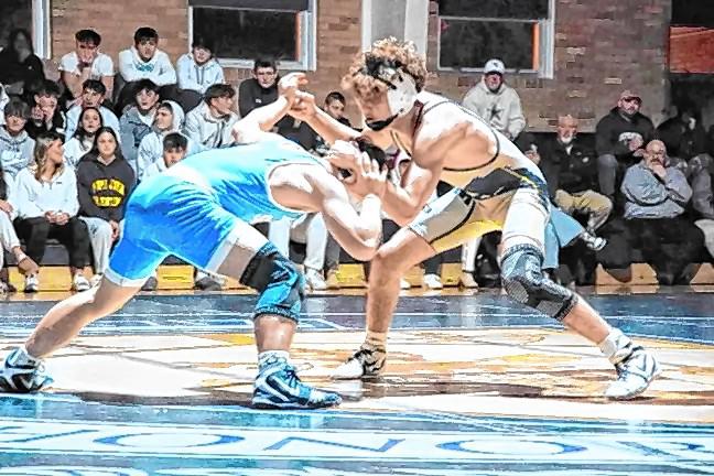 Sparta’s Chase Brodersen, left, and Pope John’s Dalton Weber battle in the 132-pound match Jan. 9. Weber won the match by technical fall, 22-4. He will compete this week in the NJSIAA state tournament. (File photo by George Leroy Hunter)