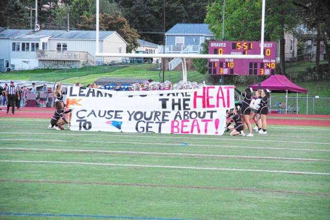 <b>A sign with a bold prediction from the Newton Braves.</b>